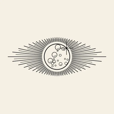 Ojo en tinta sobre crema